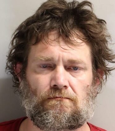 Man Arrested in Tallahassee Homicide After Body Found in Wooded Encampment
