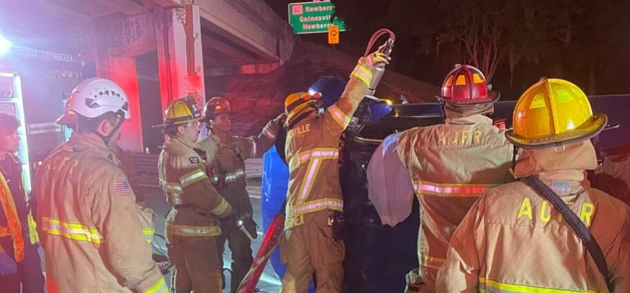 Driver Rescued from Rollover Crash Beneath East Newberry Road Overpass in Gainesville