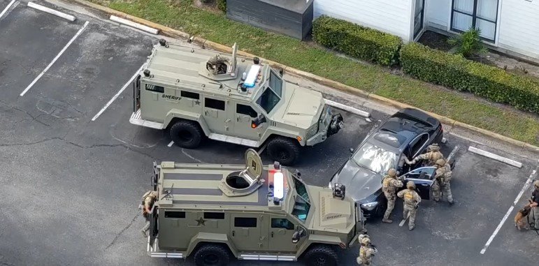 Man Arrested After Firing at Apartment Staff, Barricading Himself in Tampa Parking Lot
