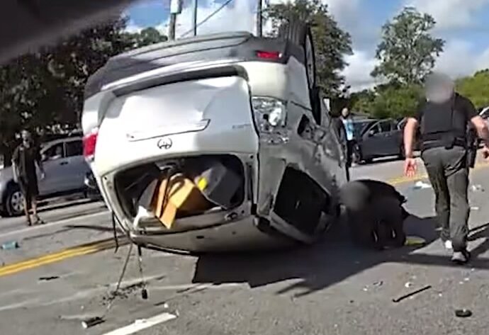 JSO Detectives Rescue Couple Trapped in Overturned SUV While En Route to Serve Warrant