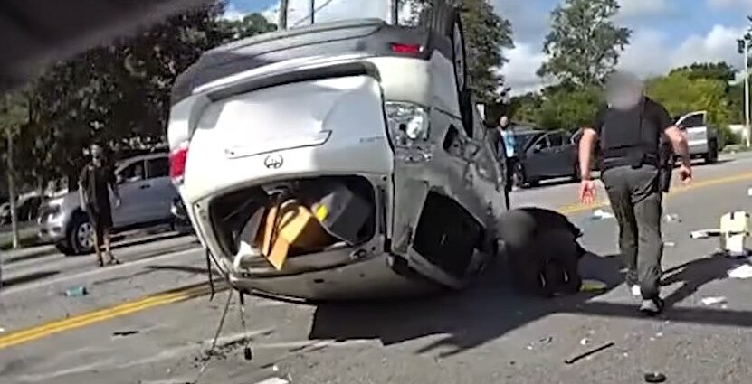 JSO Detectives Rescue Couple Trapped in Overturned SUV While En Route to Serve Warrant