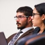 Defendant Justin Cobb in court with lawyer