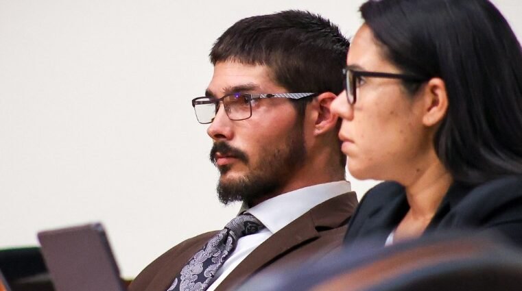 Defendant Justin Cobb in court with lawyer