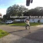 suspect-pointing-gun