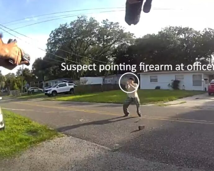 suspect-pointing-gun
