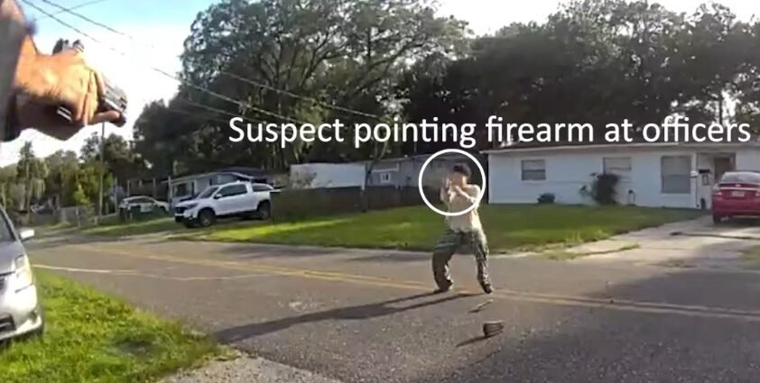 suspect-pointing-gun