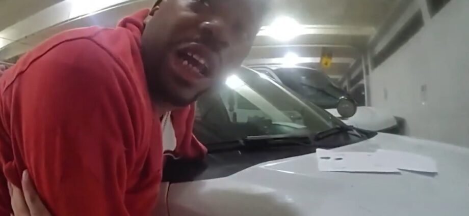 Arrest of Griffin, just before the officer hits him while handcuffed